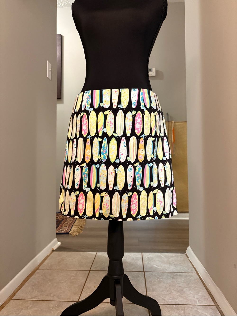 Bamboo Traders Black Mini Skirt with Pastel Surfboard Print